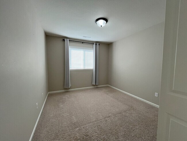 Building Photo - Spacious 4-Bedroom + Bonus Room with Modern Kitchen, Solar Panels & Private Fenced Backyard!