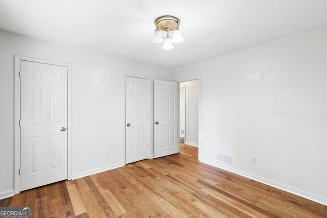 Building Photo - 5659 Whispering Pines Rd