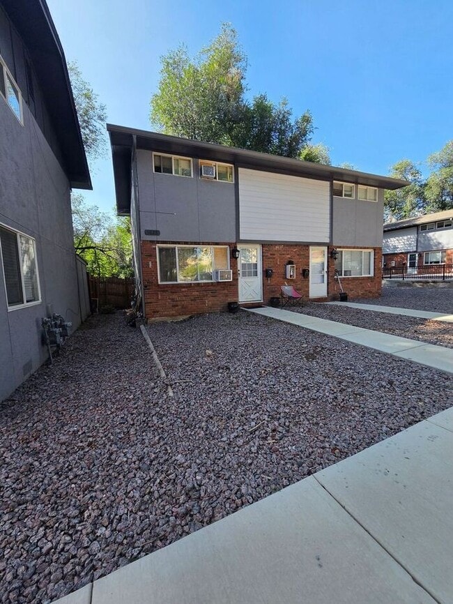 Building Photo - 2-Bedroom Townhome with Fenced Backyard and Modern Updates! |Utilities Included!