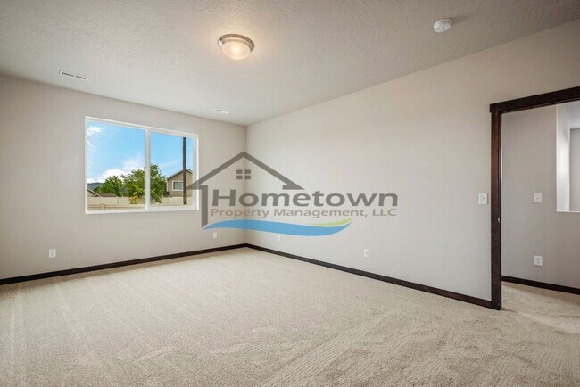 Building Photo - Woodbridge South Home with 4 Bedrooms and 3 Bathrooms in Post Falls build in 2021!