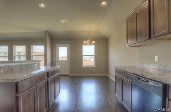 Building Photo - Stylish 4BR/2BA Home with Garage & Privacy Fence