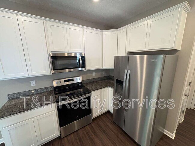 Building Photo - 5657 Brownstone Dr