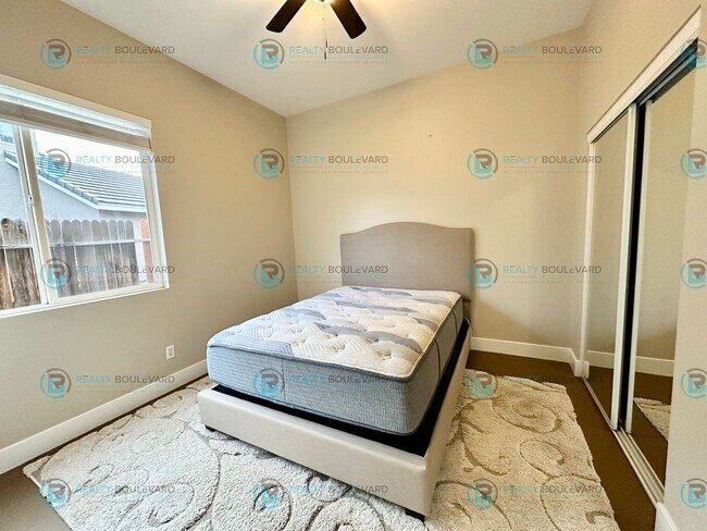 Building Photo - Open Kitchen, Expansive Living, and Covered Patio in Tranquil South Reno Near Trails, Parks & Sho...