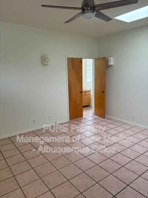 Building Photo - 8220 W Raintree Dr NE