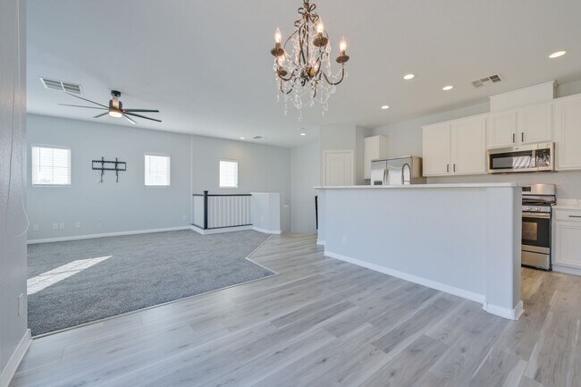 Building Photo - NW!! Gated!! Community Pool/Spa  Recreation Room!! New Paint!! New Flooring!!  Balcony!!  2 car g...