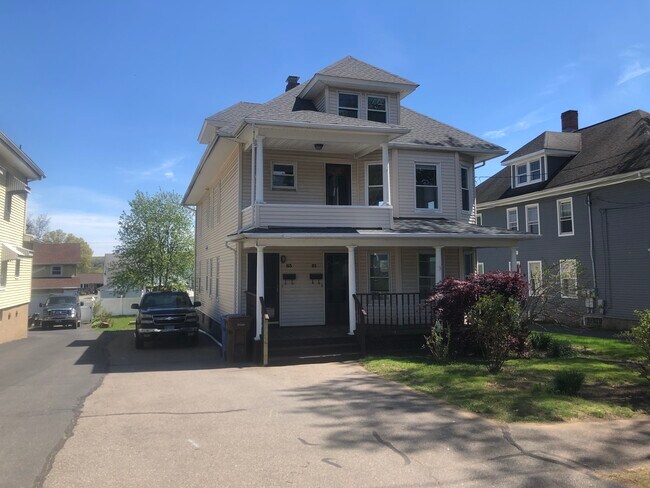 parking along house - 63 Oak Ave