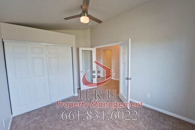 Building Photo - SW-Bakersfield  features 4 bed 2 bath with solar panels