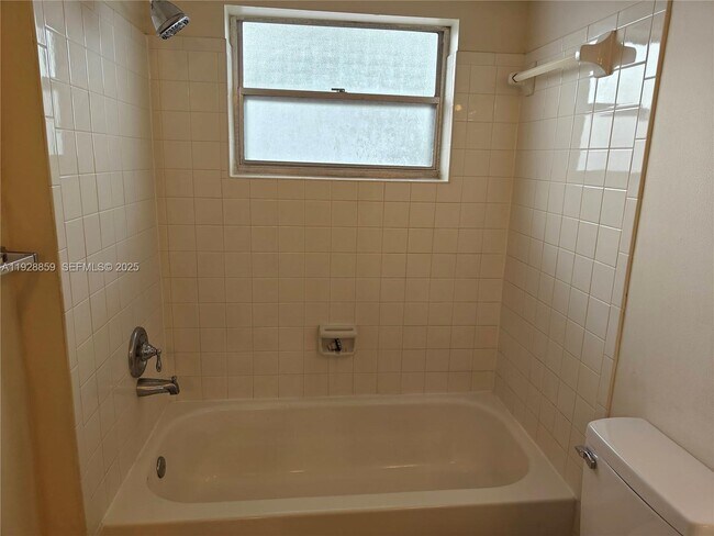 Building Photo - 8770 Royal Palm Blvd