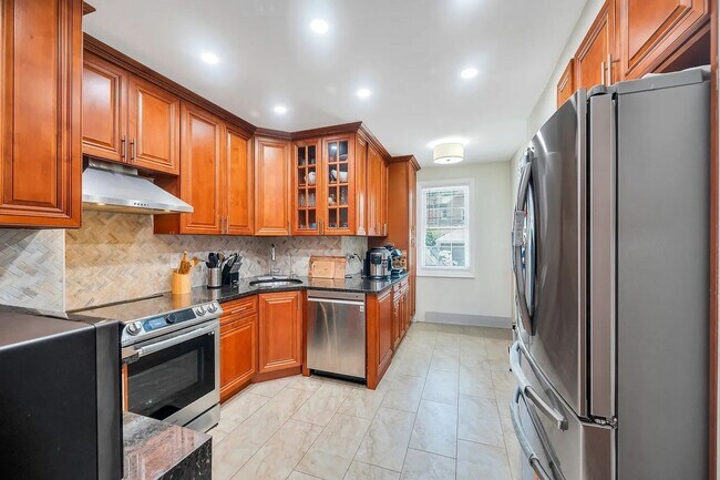 Building Photo - Experience Modern Luxury: Fully Renovated ...