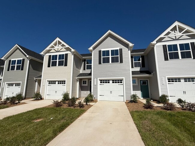 Primary Photo - Modern 3-Bedroom Townhouse with Garage & Private Patio