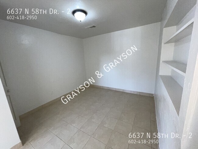 Building Photo - 6637 N 58th Dr