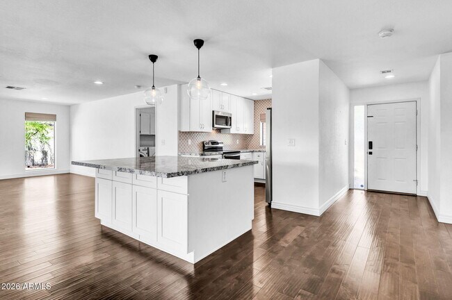 Building Photo - 5219 E Winchcomb Dr