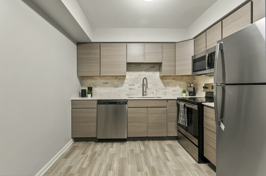 Renovated Kitchen - College Hill Apartments