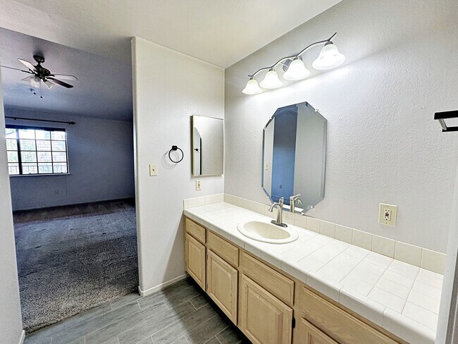 Building Photo - 1 MONTH FREE!!! 2 BEDROOM SINGLE STORY TOWNHOME 55+ COMMUNITY