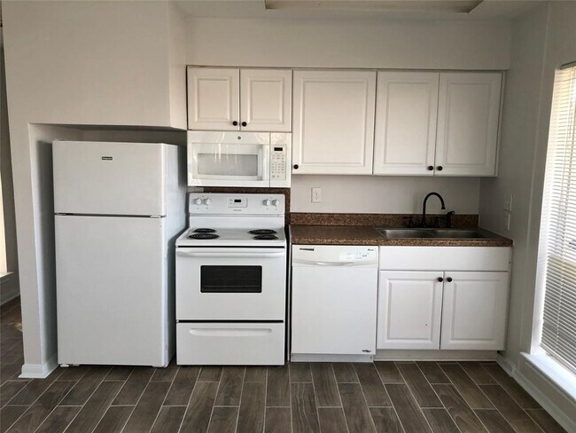 Building Photo - April Villas Triplex