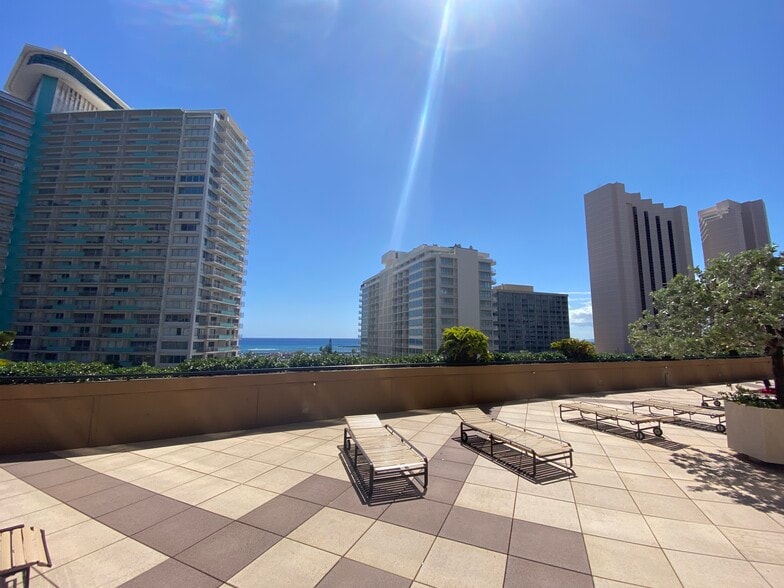 Lounge chairs and View from pool deck - 1778 Ala Moana Blvd
