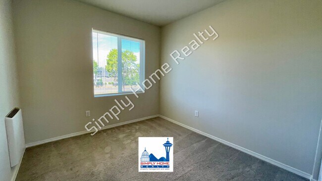 Building Photo - Step Inside to a Townhome Made for Easy Living!
