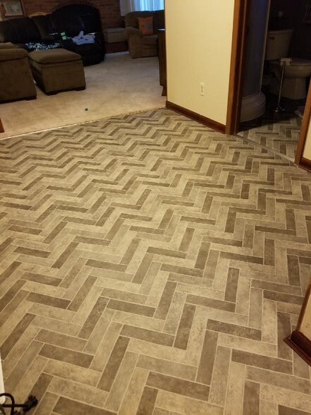 New Chevron tile in Family Hallway - 2781 19th Ave NE