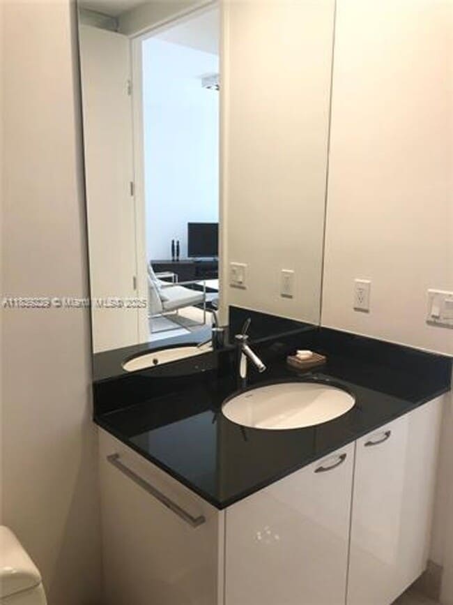 Building Photo - 15811 Collins Ave