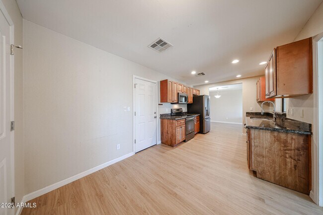 Building Photo - 6539 E Arbor Ave