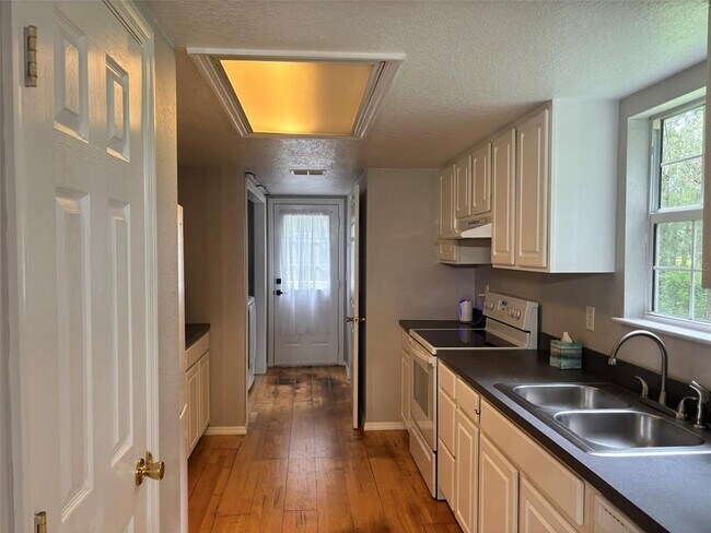 Building Photo - 4390 NE 140th Ct