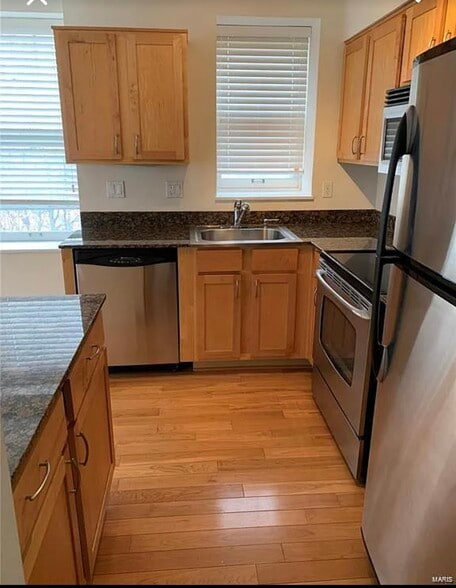 Maple cabinetry; granite countertops - 5350 Pershing Ave