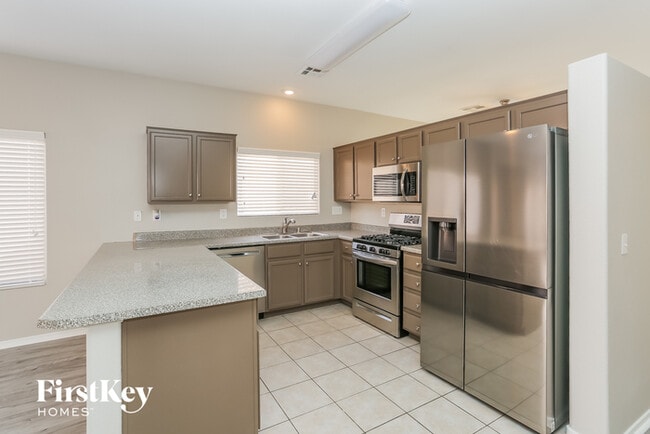 Building Photo - 6233 Highland Gardens Dr