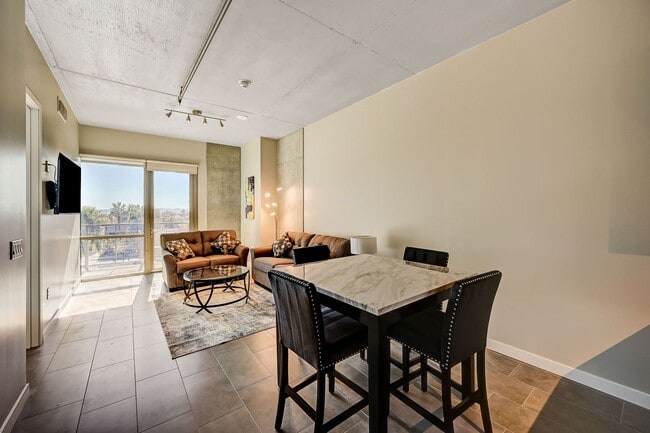 Building Photo - Fully Furnished 4th-Floor Condo with Stunn...