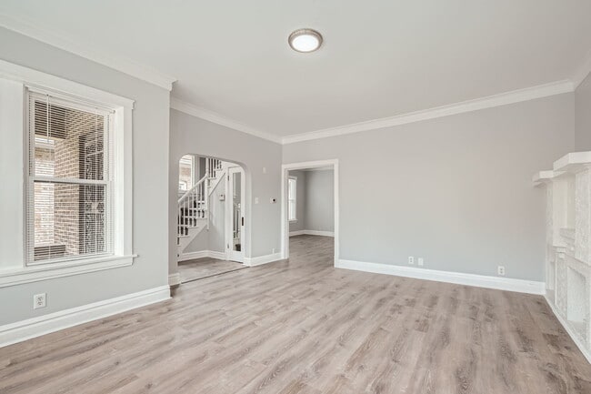 Building Photo - 7449 S Vernon Ave