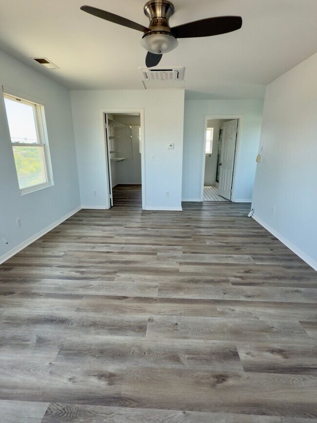 Building Photo - Renovated 3-Bedroom Home with Private Mast...
