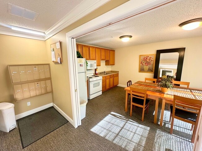 Building Photo - Modern 2-Bedroom Condo with Balcony & Heat...