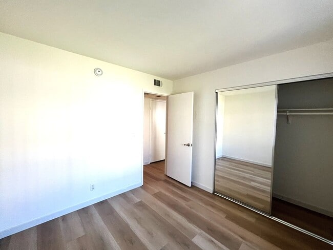 Building Photo - Ground Level 2 Bedroom Condo with Private Patio in Gated Community for Lease