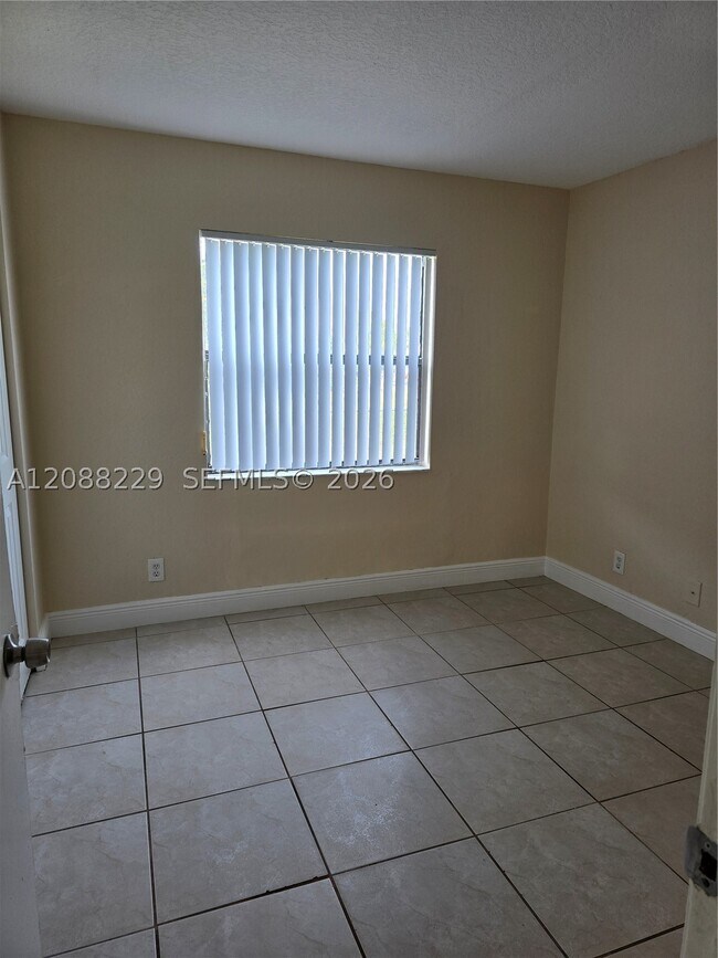 Building Photo - 4181 NW 114th Ave