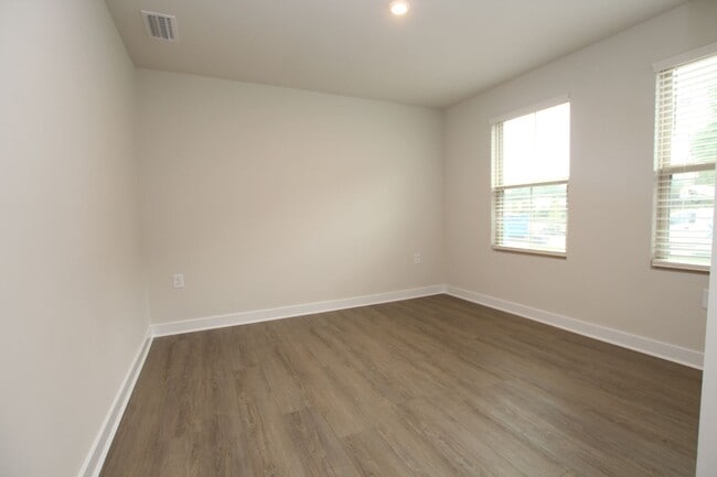 Building Photo - Maintenance Free Living in this Brand New ...