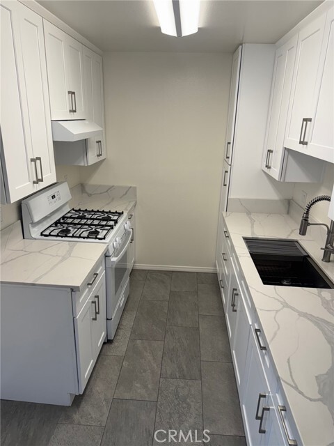 Building Photo - 7039 Remmet Ave