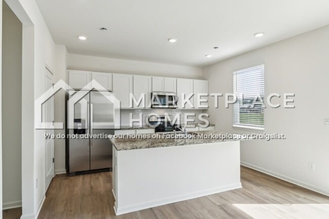 Building Photo - 7123 Train Station Way