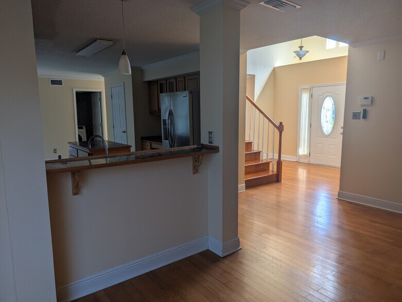 View of Kitchen bar from living room - 2011 Dylan Dr