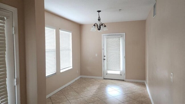 Building Photo - 9839 Tivoli Villa Dr