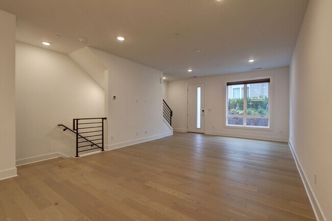 Building Photo - Live Where Style Meets Convenience – 2BR Townhome + Garage