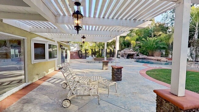 Building Photo - Large 4 Bedroom House with Pebble Bottom Pool - Backyard Oasis!