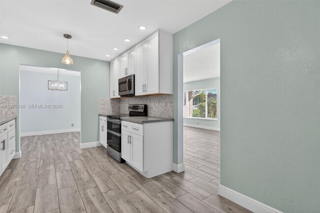 Building Photo - 7613 NW 67th Ave