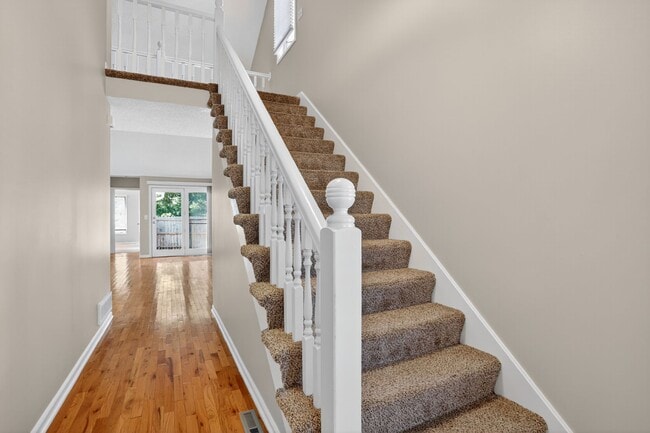 Building Photo - Renovated 3BR/2.5BA Townhome in Blue Valley Schools with Full Basement & 2-Car Garage