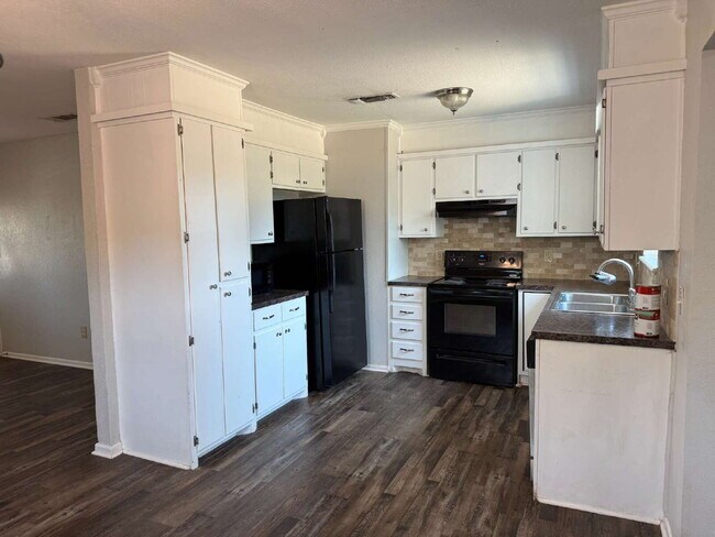 Building Photo - Updated 3 bedroom one bath home with a shade tree and large yard.