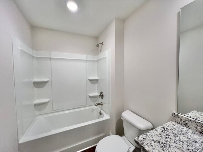 Building Photo - Stunning 3BD, 3BA End Unit Raleigh Townhome on a Corner Lot with High End Features in an HOA Comm...