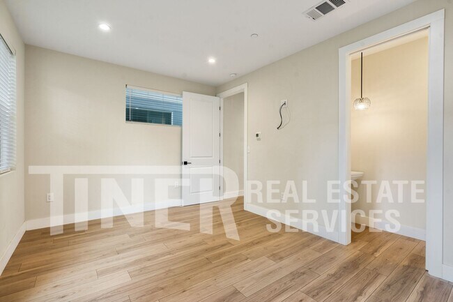 Building Photo - Elegant Modern Living
