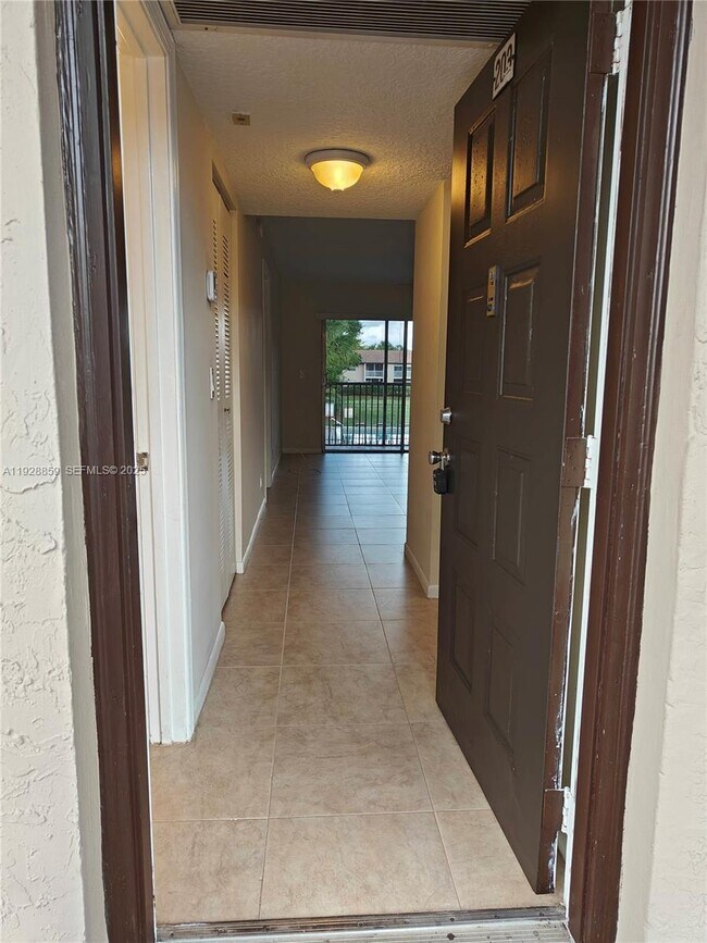 Building Photo - 8770 Royal Palm Blvd