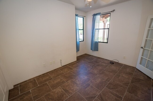 Building Photo - Gorgeous 3 Bedroom 2 Bathroom Home with Tile Throughout! Central A/C, 2 Car Garage!