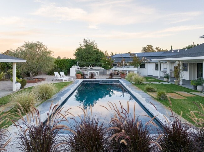 Building Photo - PURE Property Management Presents