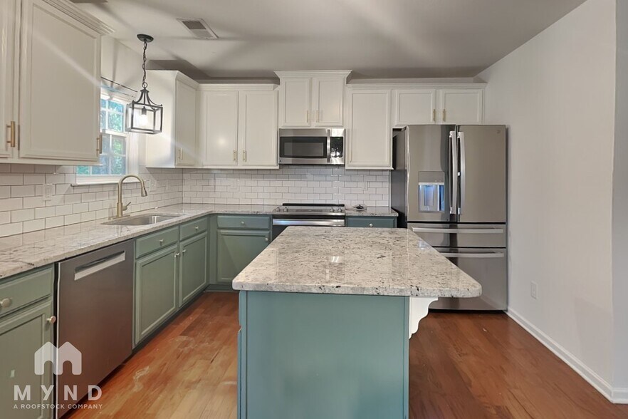 Building Photo - 1858 Woodstone Dr