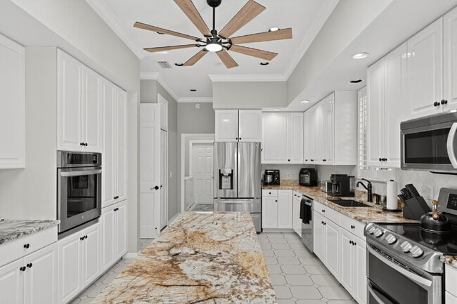 Building Photo - Winter season on the Boca Royale golf course, furnished pool home with club membership